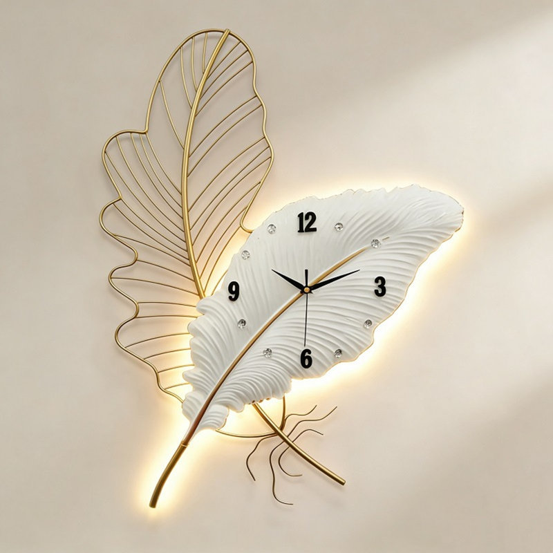 Horloge murale en plumes avec lumière DEL, horloge murale en métal de luxe moderne, sculpture murale silencieuse sans tic pour le salon, la chambre à coucher et le bureau