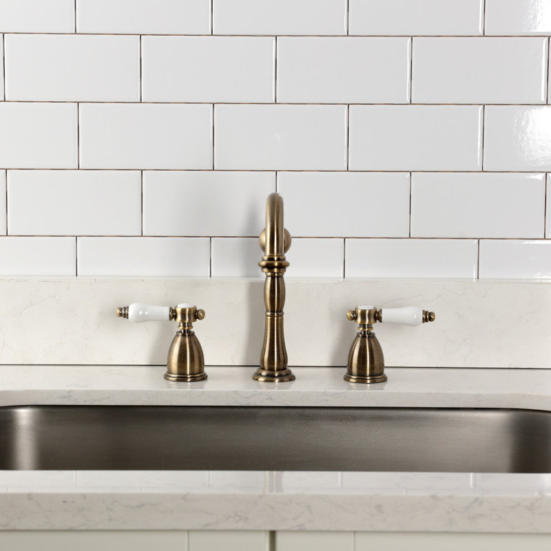 Kingston Brass Bel-Air Double-Handle Widespread Kitchen Faucet, Without Side Spray, Antique Brass