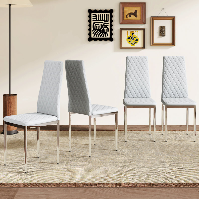 4 chaises de salle à manger grises - modernes et minimalistes. Siège en PU, pieds en métal argenté pour plus de stabilité. Confortable, pieds antidérapants. Siège 4 pièces facile à installer avec des pieds doux au toucher. Ergonomique