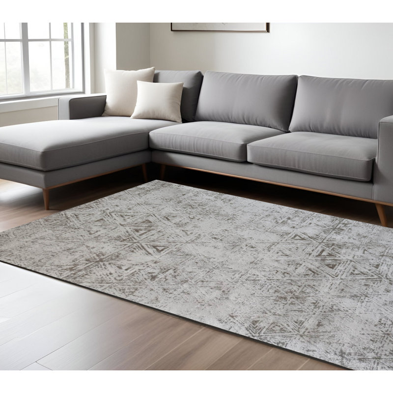 5' X 8' Cream and Beige Abstract Area Rug