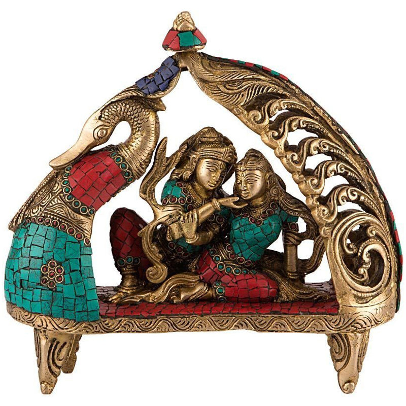 Radha Krishna assise sur un paon