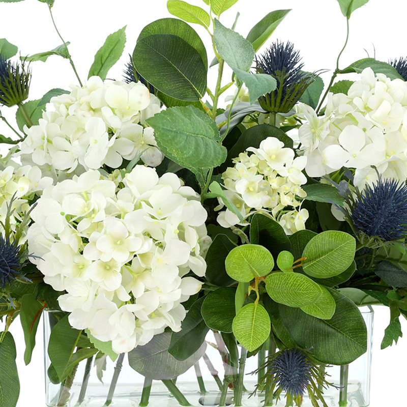 Hydrangea and Thistle Floral Arrangement in a Rectangular Glass Vase