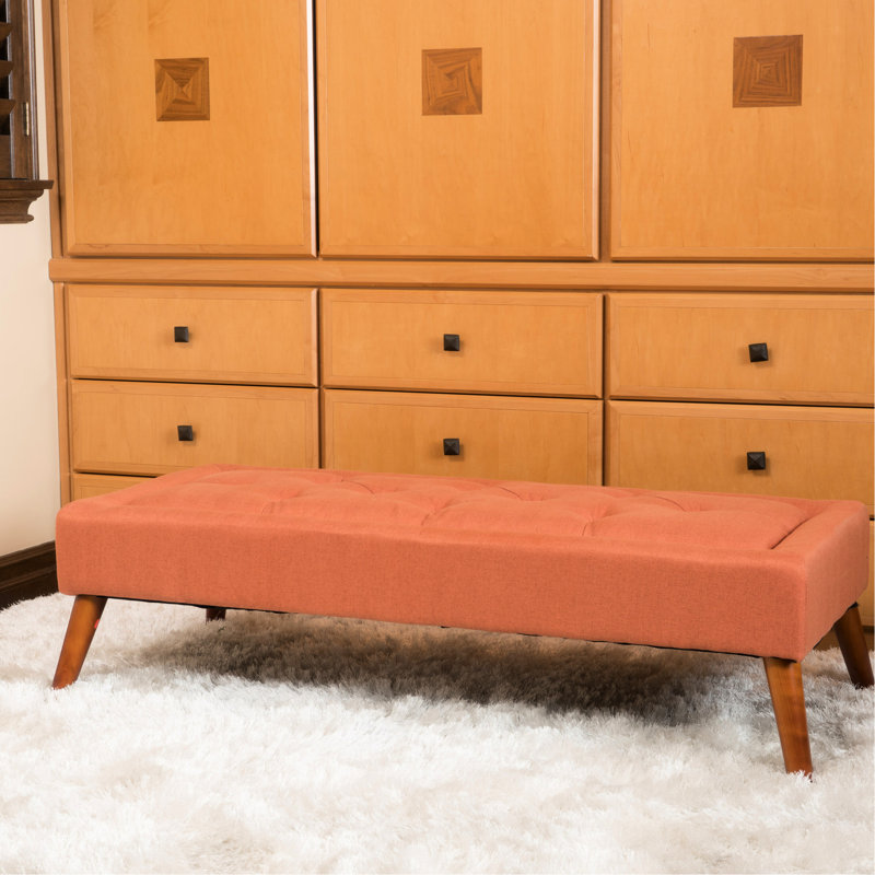 Dessus capitonné - Tissu orange attrayant avec pieds inclinés. Matériau en bouleau. 52 po X 23 16 28 lb Des sièges polyvalents et merveilleux. Ajoute du caractère à la pièce. Profondeur Largeur Hauteur. Lb