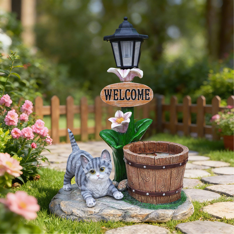 Décoration de jardin jardinière chat allongé