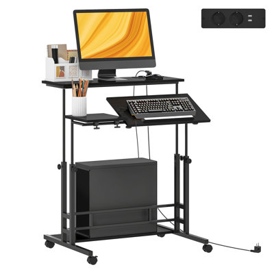 Bureau assis-debout réglable en hauteur HOMCOM avec prises électriques, plateau inclinable, roulettes verrouillables et tablette inférieure, noir