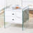 Double-drawer bedside table. The board surface is MDF with white grain sticker, and both sides are transparent tempered glass. The design is simple and elegant, with excellent storage functions.