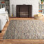 Tapis gris à motif floral Aratrika-79961668