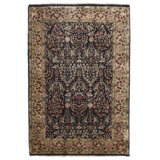 Millefleur Wool Oriental Area Rug in Black/Brown/Light Green/Rust