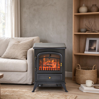 Cheminée électrique HOMCOM 22 po sur pied, noire et portable, avec flammes et bûches DEL réalistes, double puissance de chauffage 750 W/1500 W, protection contre la surchauffe et le basculement.