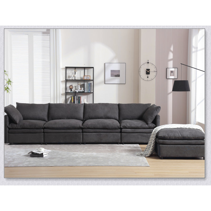 Canapé modulaire en U avec revêtement de haute qualité et sièges spacieux, parfait pour la vie moderne et les réceptions.