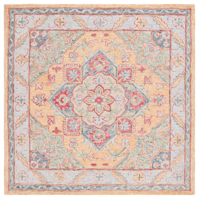 Eldiona Hand Tufted Wool/Cotton/Latex Oriental Rug in Yellow/Rust