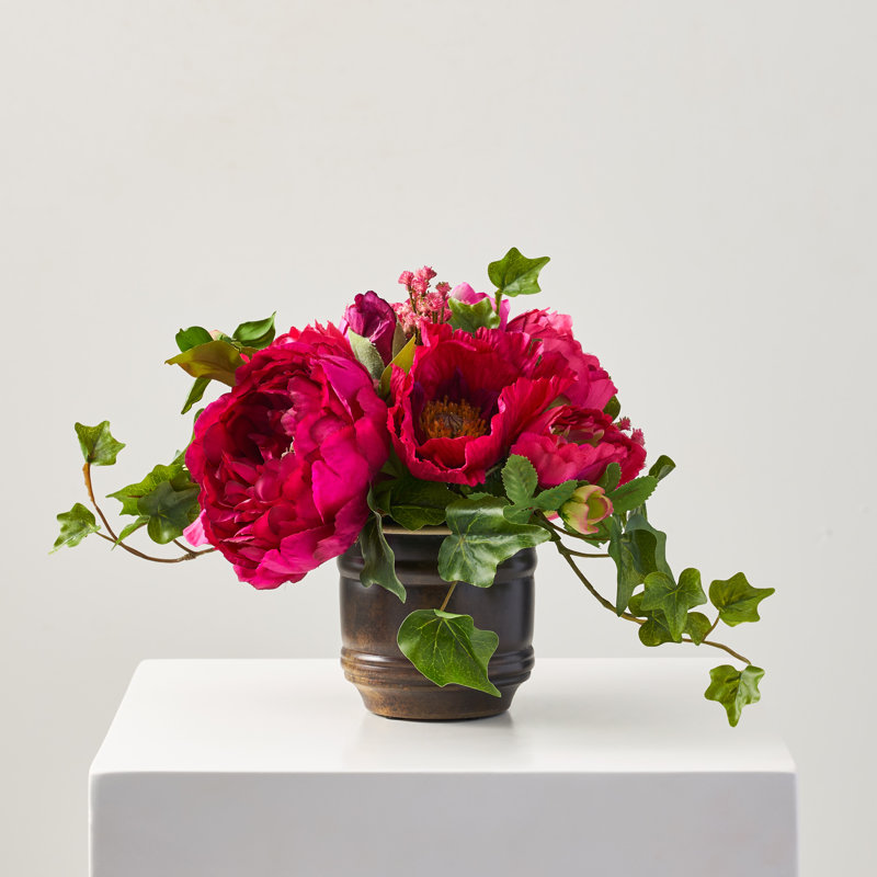 Arrangement floral pivoine fuchsia en pot