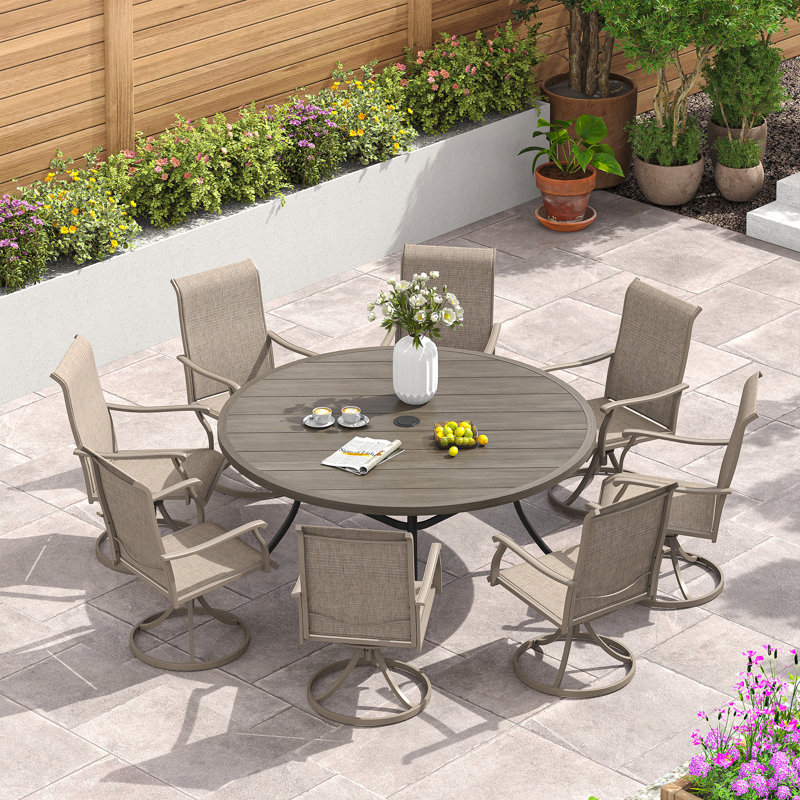 Nectarie Round 8 - Person 54'' L Outdoor Patio Dining Set with 8 Swivel PVC-Coated Polyester Chairs