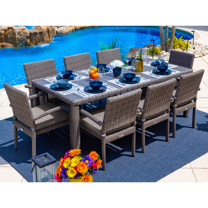 Aleyza 8 - Person Wicker Patio Dining Set with Rectangular Table , Sunbrella® Cushions Included, Taupe