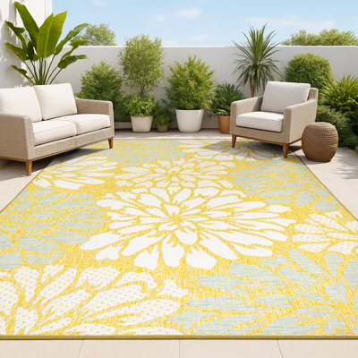 Tapis intérieur / extérieur à motif floral texturé jaune / crème Zinnia