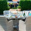 Balcom 6 - Person Patio Dining Set Umbrella Hole Included Round Table with Cushions Included