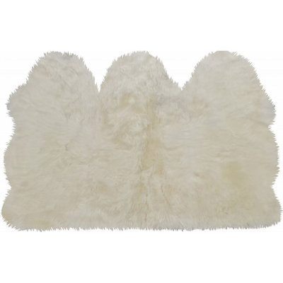 Tapis doré en peau de mouton fait à la main Cyanne