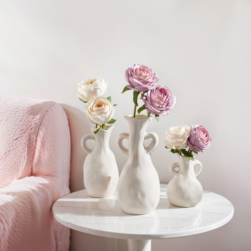 3 petits vases blancs pour la table basse du salon