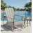 Silver-Grey HDPE All-Weather Folding Adirondack Chair With Wood Grain Texture And Cup Holder. Ideal For Patios, Pools, Backyards, And Terraces.