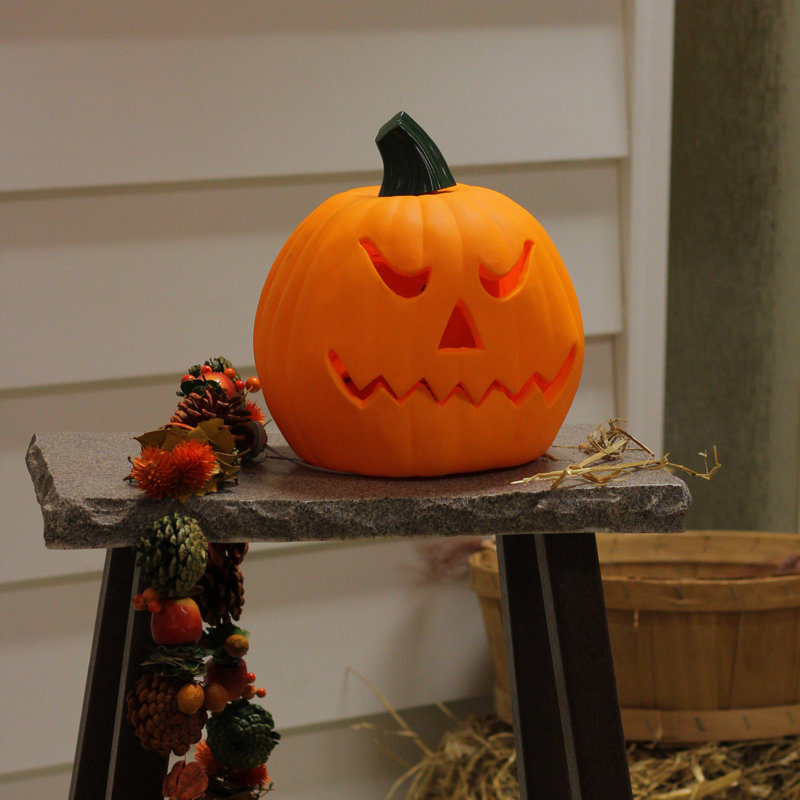 9.75" Orange and Green Plastic Animated Pumpkin Figurine