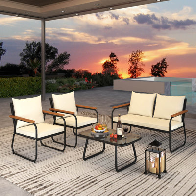Ensemble de 4 meubles de patio avec table basse en verre trempé et chaises en rotin