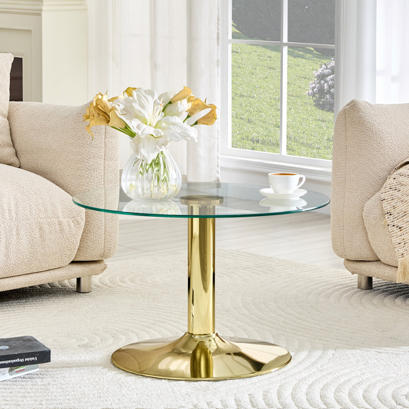 Table basse ronde en verre trempé. 17,7 pouces de haut, soutenu par une base en métal doré, avec un bord de luxe léger., Doré