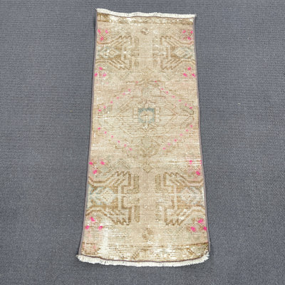 Tapis beige 15 x 35 pouces