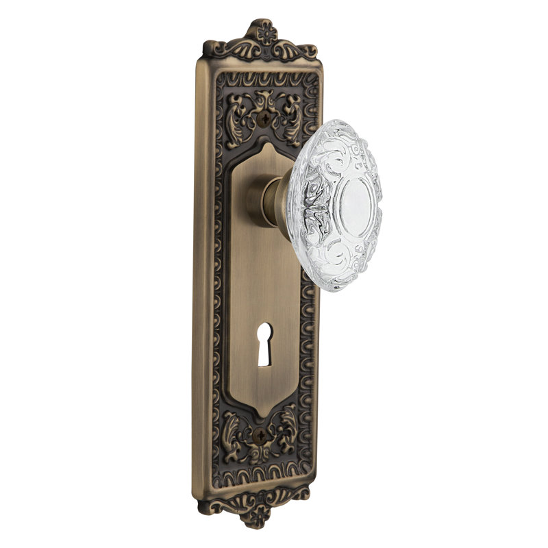 Egg & Dart Plate with Decorative Keyhole and Crystal Victorian Knob, Antique Brass