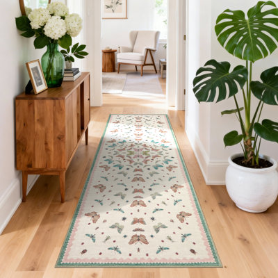 Tapis vintage à motifs papillons et poils ras