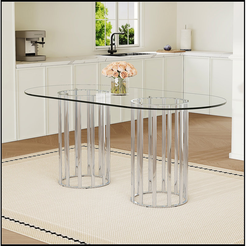 Table de salle à manger ovale en verre trempé de 71 pouces avec base à deux colonnes dorées pour espaces de lumière modernes et luxueux