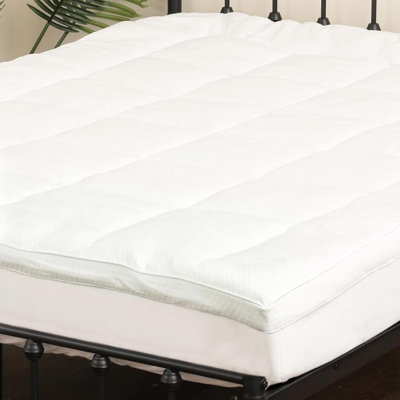 Surmatelas double, épais et moelleux, respirant, blanc.