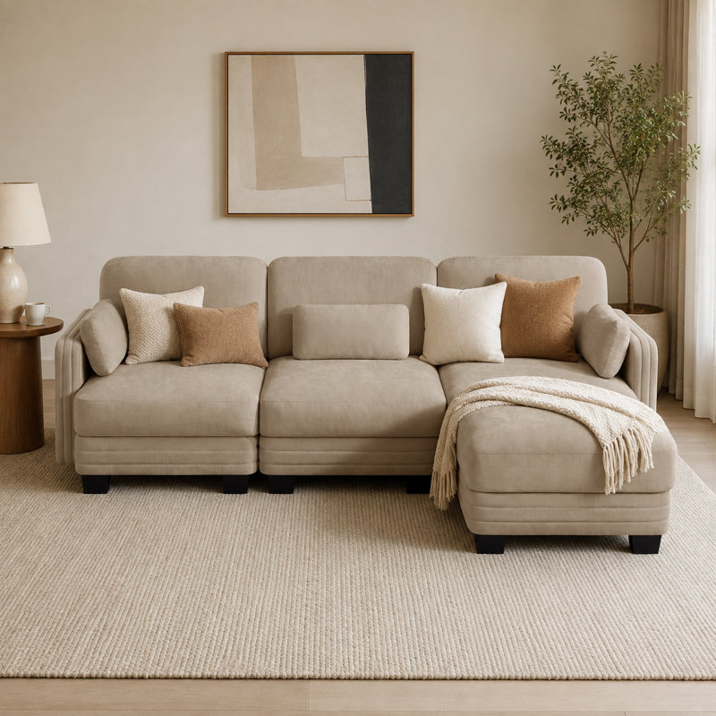 Canapé d'angle 3 places Channell en forme de L, capitonné, avec pouf amovible, style moderne et minimaliste, revêtement en chenille, mousse haute résilience, assise matelassée