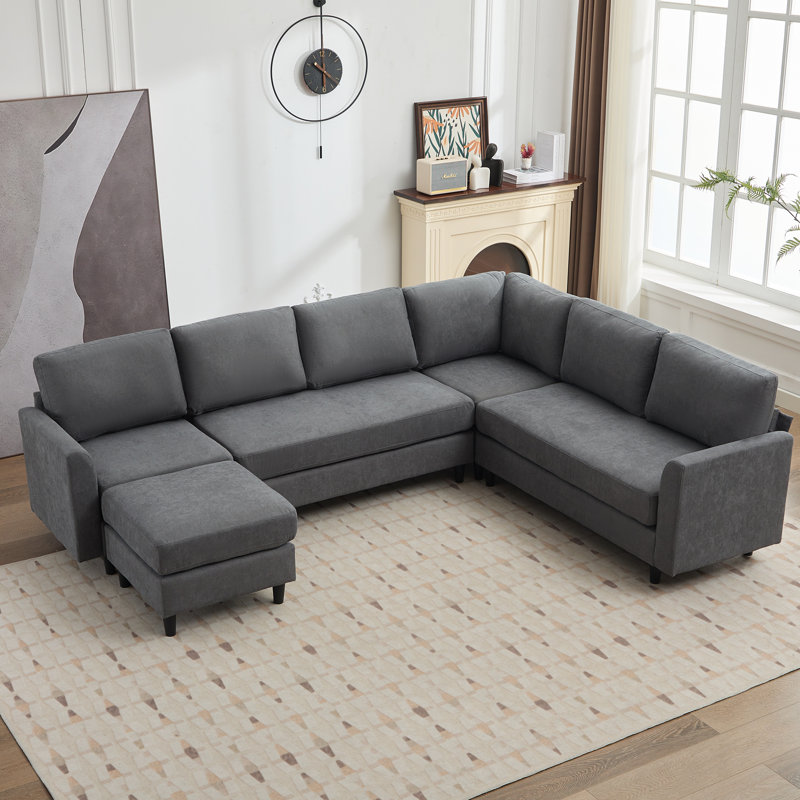 Canapé modulaire 107,3 po avec accoudoirs noirs et repose-pieds mobile pour 7 personnes Lyles, Tissu bleu sarcelle