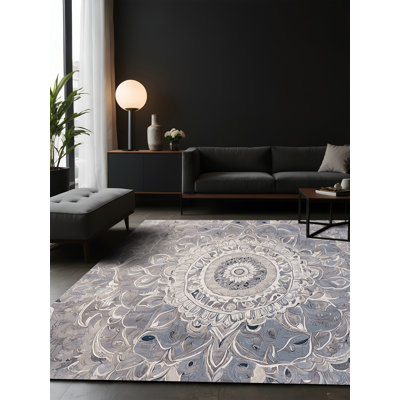 Tapis gris soyeux et moelleux