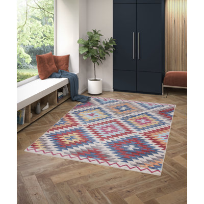 Levesque Ikat Area Rug