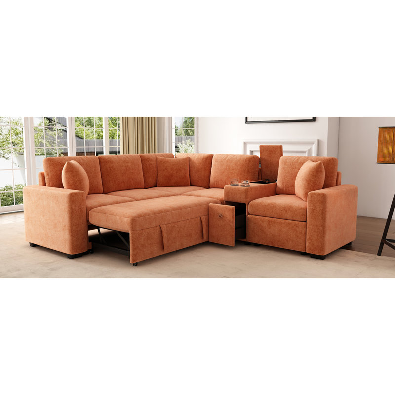 Lit convertible en L de 306 cm avec lit gigogne, rangement astucieux, porte-gobelets et revêtement en chenille douce pour une ambiance relaxante dans votre salon orange. Optimisation de l'espace et du rangement.
