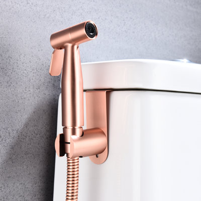 Le bidet de toilette en métal rose doré - à main, offre des soins hygiéniques efficaces avec un débit de jet personnalisable et une surface hygiénique à main pour le métal, nettoyage polyvalent