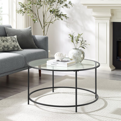 Doynton 4 Legs Coffee Table by Zipcode Design