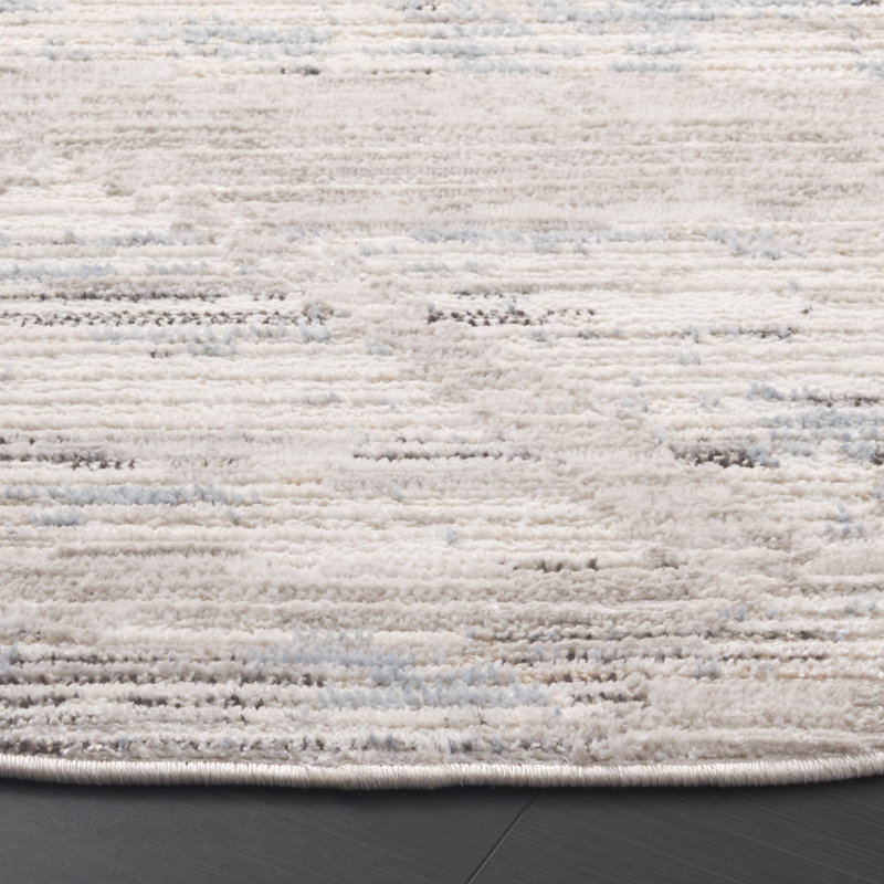 Arbin Performance Abstract Indoor/Outdoor Area Rug, Round 6'7"