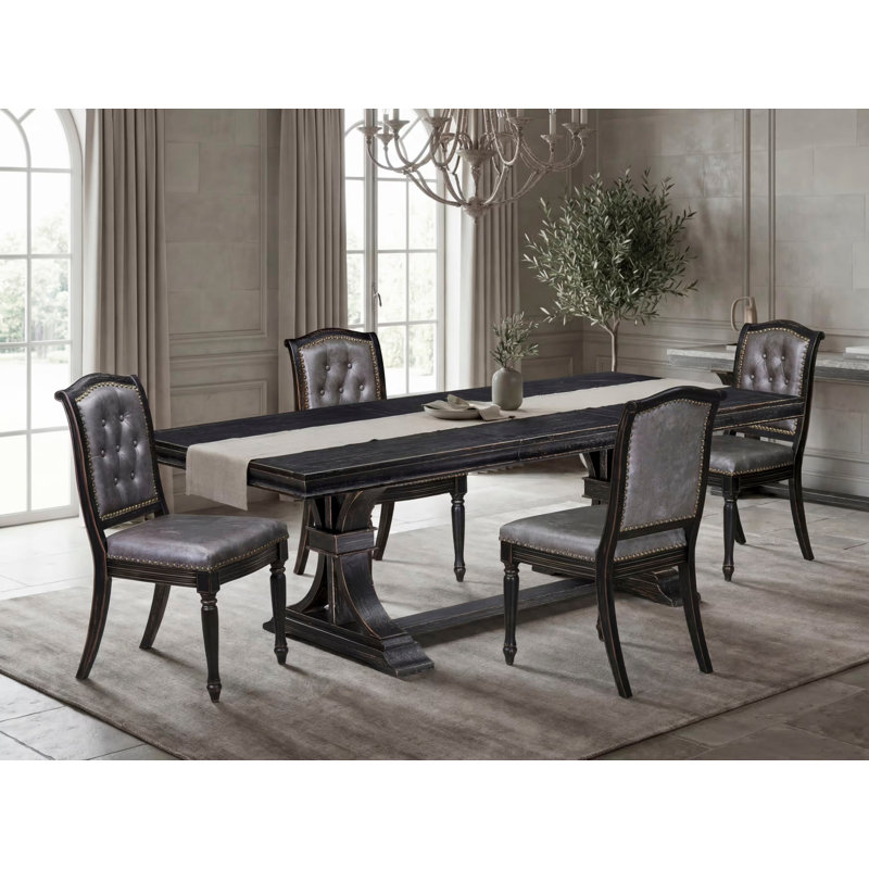 Cet ensemble de salle à manger moderne 5 pièces se compose d'une table et de 4 chaises de salle à manger en similicuir gris foncé avec dossier capitonné - Finition sable