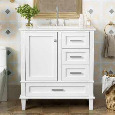 Meuble-lavabo de salle de bain blanc 30 po - Fabrication moderne en bois massif. Comprend un lavabo, 3 tiroirs et une porte à fermeture en douceur pour une structure soignée. Rangement équipé