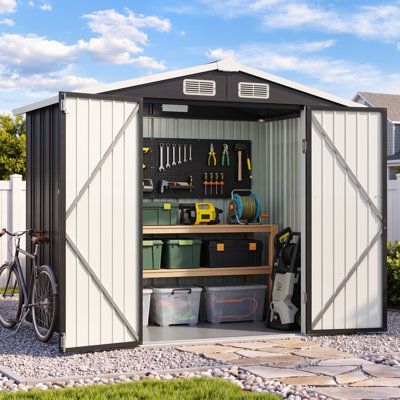 Abri de jardin en métal noir, 1,83 m de large x 1,22 m de profondeur, avec plancher et double porte.