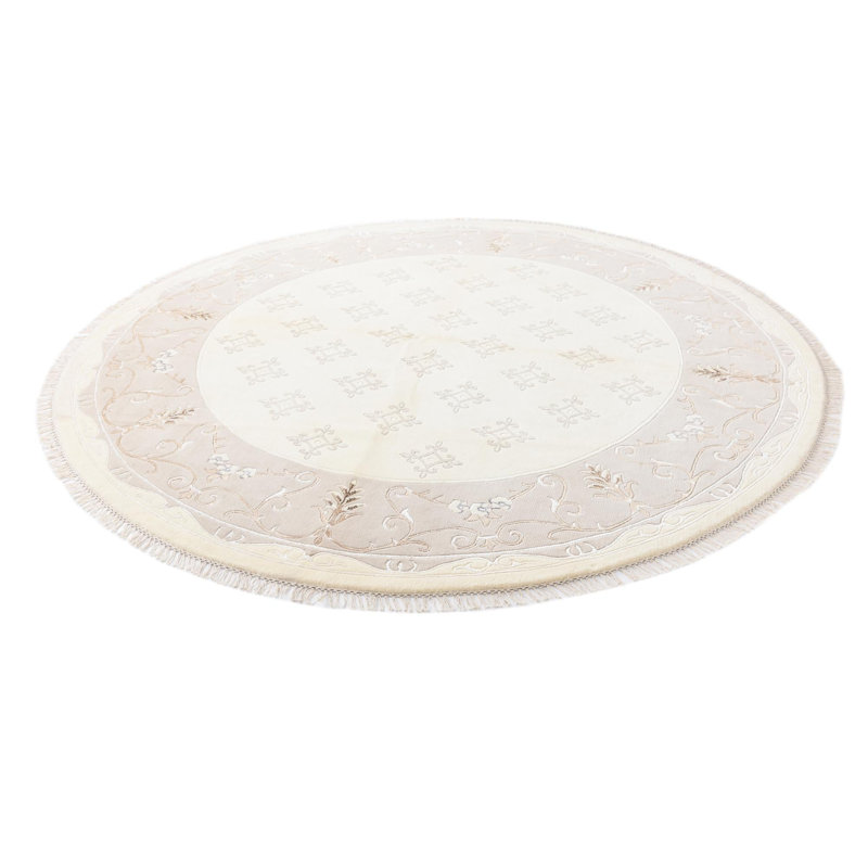 Tapis rond beige clair Howard