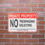Plaque en métal étain «No Soliciting Violators»