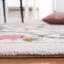 Tapis floral en laine touffeté à la main Jamaine-68860747