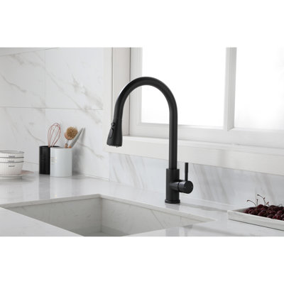 Robinet de cuisine moderne avec douchette extractible en acier inoxydable, finition noir mat pour un robinet contemporain, surface corrosive et rouillée