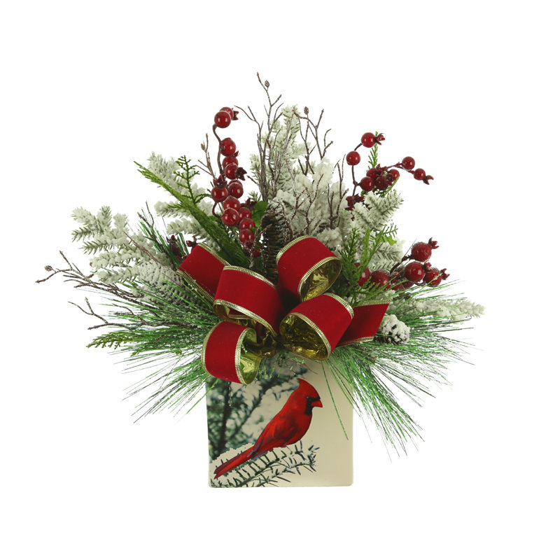 Snow Covered Greens And Berries In Cardinal Vase