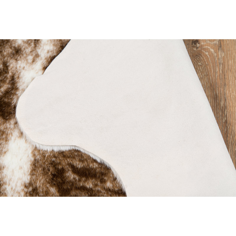 Acadia Animal Print Area Rug in Brown