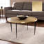 Table basse ronde avec plateau en relief