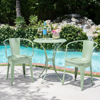 Ensemble bistro 3 pièces en métal avec finition résistante aux intempéries et détails floraux, pour une détente en plein air